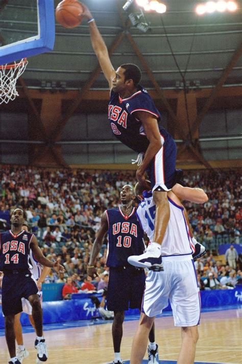 vince carter dunks over 7'2.